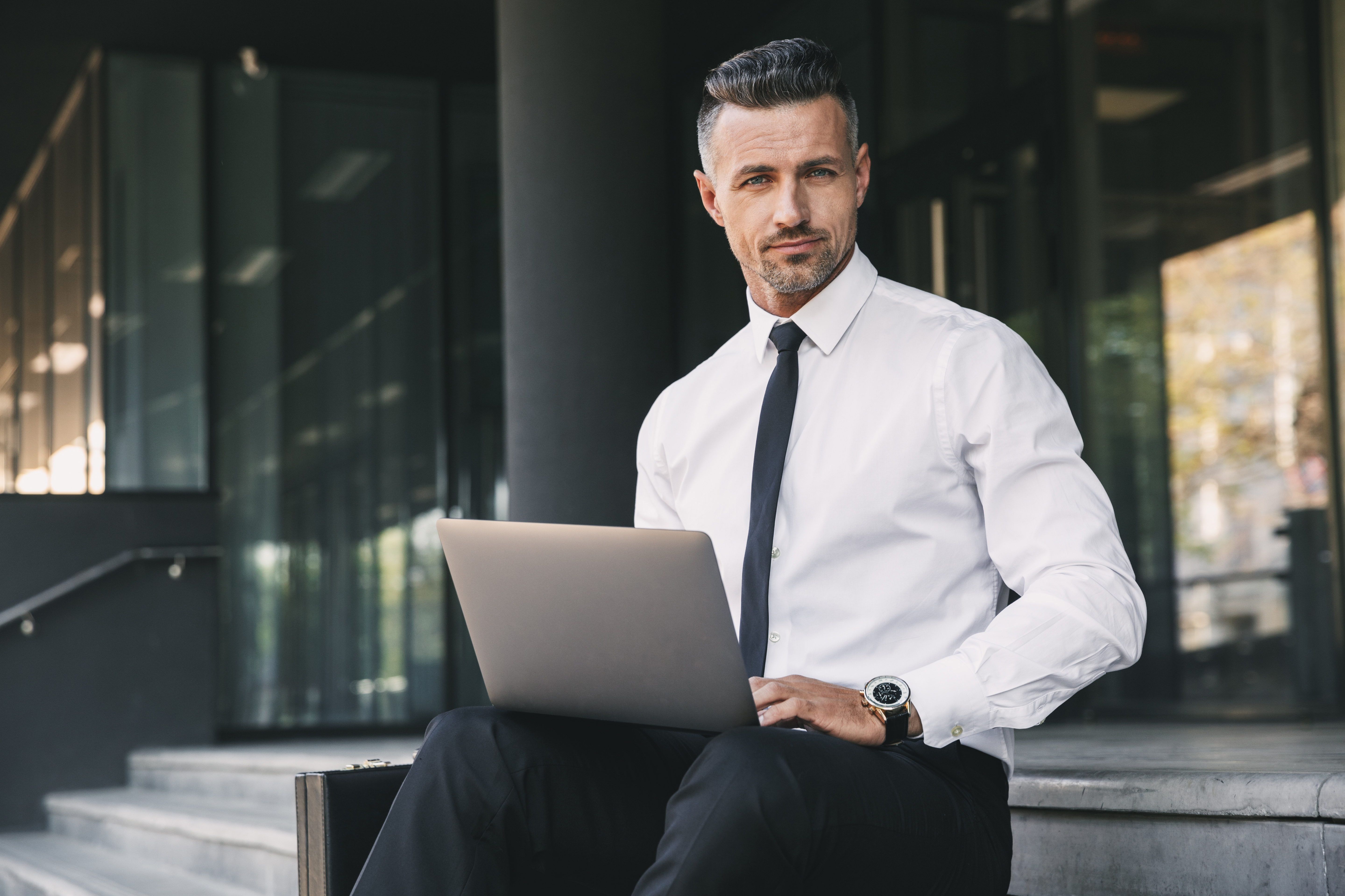 Adviser working on a laptop