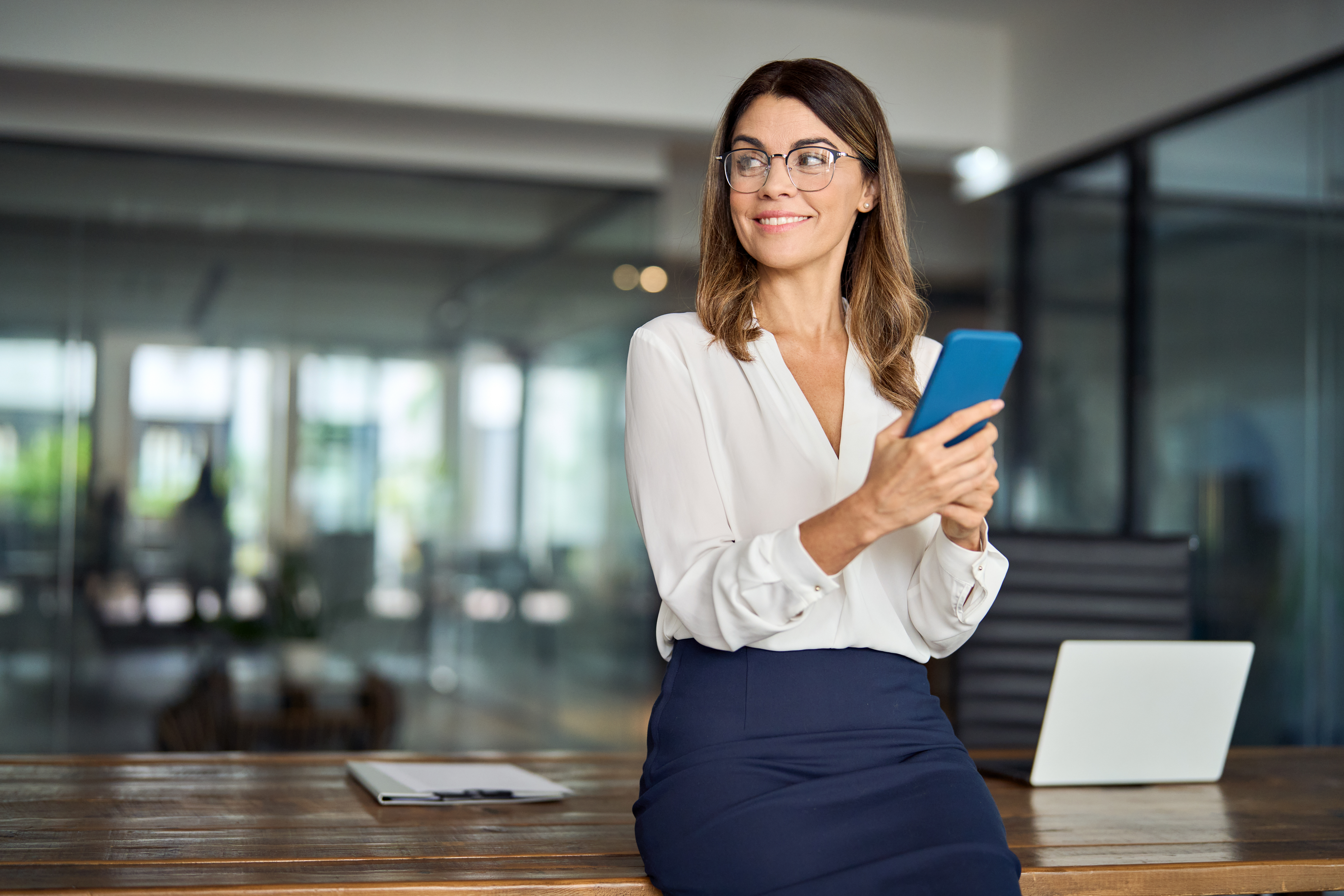 Financial services professional using her phone